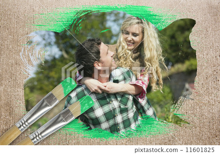 Composite image of happy couple in the countryside 11601825