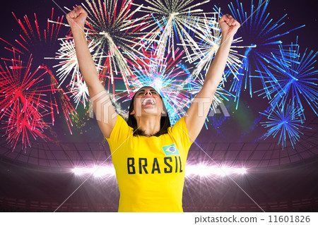Composite image of excited football fan in brasil tshirt 11601826