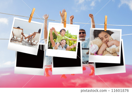 Composite image of instant photos hanging on a line 11601876