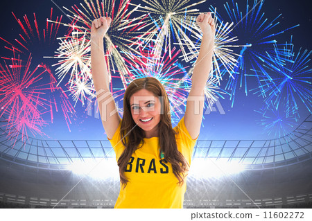 Composite image of pretty football fan in brasil t-shirt Composite image of pretty football fan in brasil t-shirt 11602272