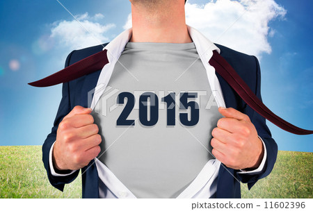 Composite image of businessman opening shirt in superhero style 11602396