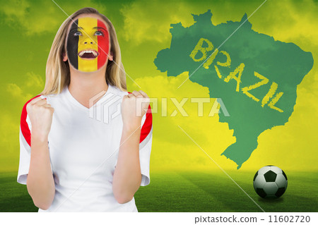 Composite image of excited belgium fan in face paint cheering Composite image of excited belgium fan in face paint cheering 11602720