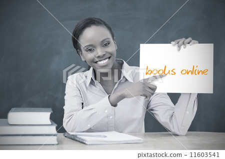 Happy teacher holding page showing books online Happy teacher holding page showing books online 11603541