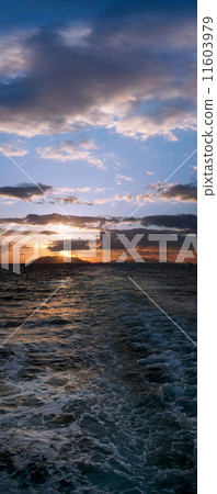 Panoramic sunset over boat motor ripples on the water 11603979