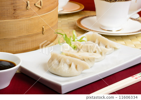 Jiaozi - Chinese dumplings with pork & spring onions. Dim Sum  11606334