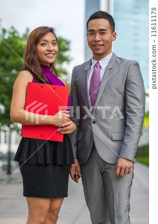 Portrait of two young dynamic and successful asian colleagues 11611178