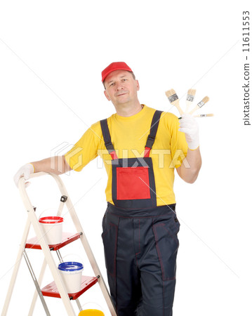 Worker standing on ladder. 11611553