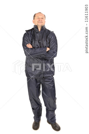 Worker wearing worksuit. 11611903