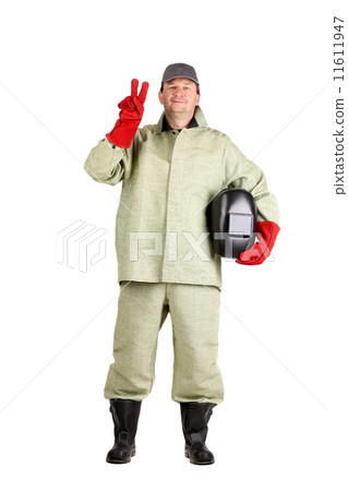 Welder shows peace sign. 11611947