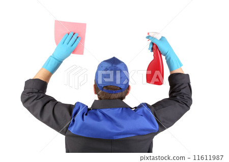 Man holds spray bottle and sponge. 11611987