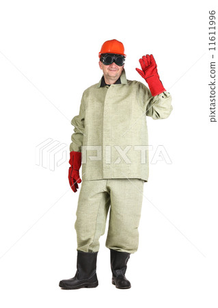 Welder in hard hat with hand up. Welder in hard hat with hand up. 11611996
