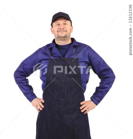 Worker wearing black apron. Worker wearing black apron. 11612336