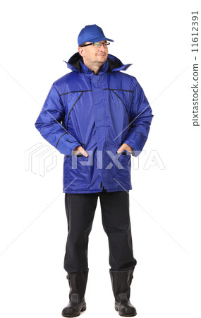 Man in blue winter workwear. Portrait. 11612391