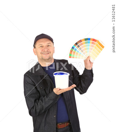 Worker with color samples. Worker with color samples. 11612481