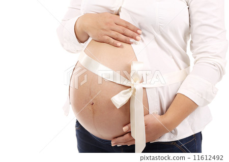 Belly of pregnant woman. 11612492