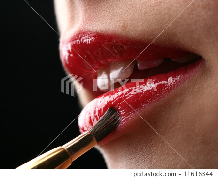 putting lipstick putting lipstick 11616344