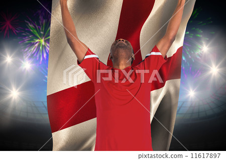 Composite image of excited handsome football fan cheering Composite image of excited handsome football fan cheering 11617897