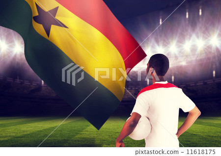 Composite image of football fan in white holding ball Composite image of football fan in white holding ball 11618175