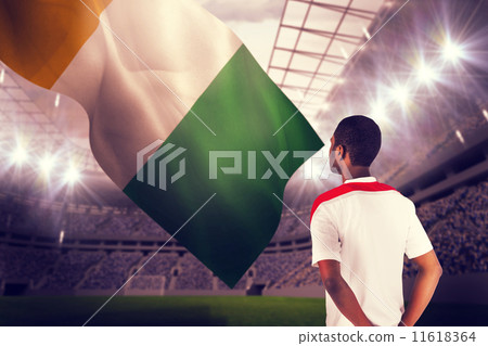Composite image of football fan in white standing 11618364