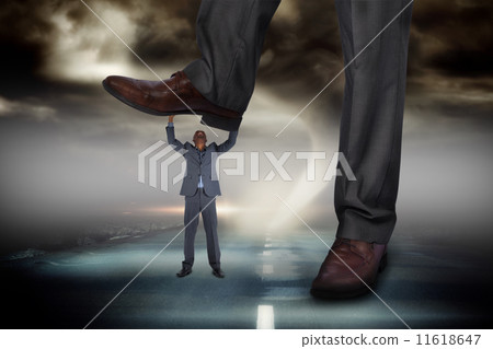 Composite image of businessman stepping on tiny businessman 11618647