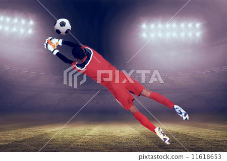 Composite image of goalkeeper in red making a save Composite image of goalkeeper in red making a save 11618653