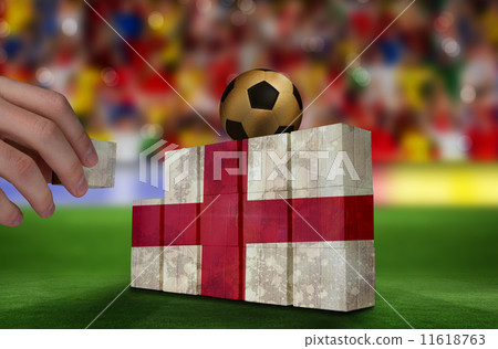 Composite image of hand building wall 11618763