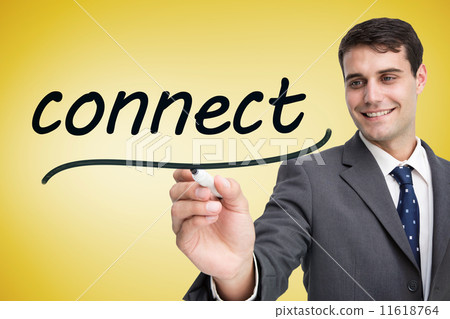 Businessman writing the word connect 11618764