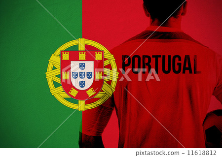 Composite image of portugal football player holding ball 11618812