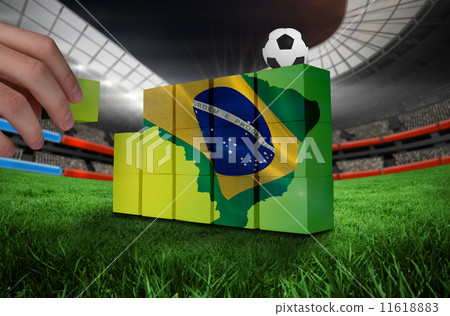 Composite image of hand building wall 11618883