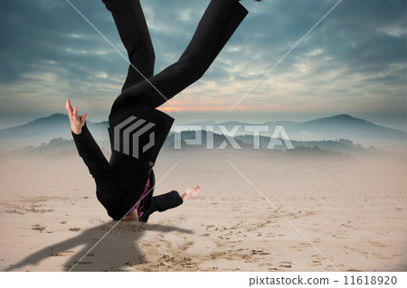 Composite image of businesswoman burying her head Composite image of businesswoman burying her head 11618920