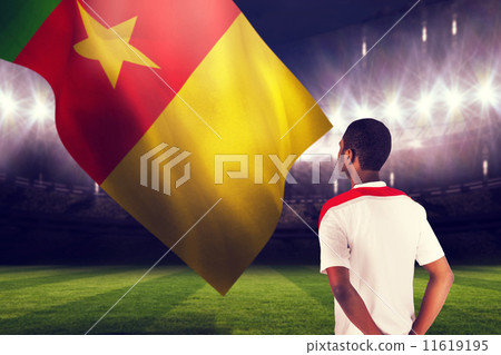 Composite image of football fan in white standing 11619195