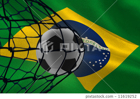 Composite image of football in back of the net 11619252