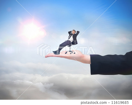Composite image of businessman relaxing in swivel chair 11619685