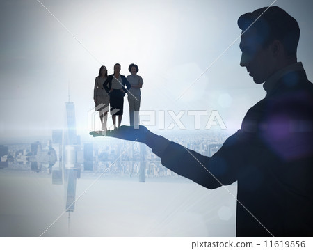 Composite image of businessman holding business team Composite image of businessman holding business team 11619856
