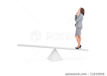 Composite image of focused businesswoman on scales 11619946