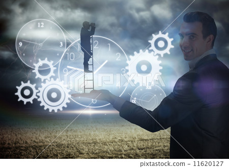 Composite image of businessman standing on ladder 11620127