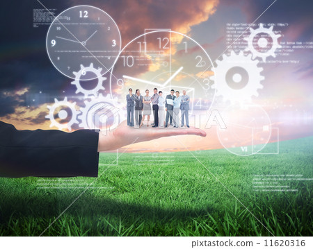 Composite image of business team looking at camera 11620316