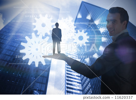 Composite image of smiling attractive architect on phone holding Composite image of smiling attractive architect on phone holding 11620337