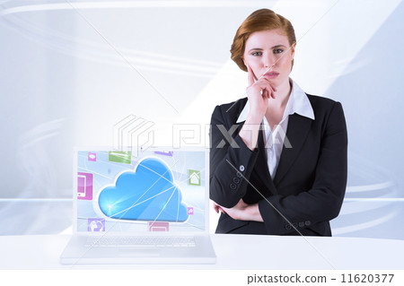 Composite image of thinking redhead businesswoman 11620377