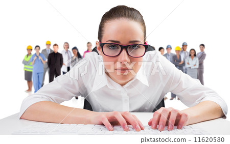 Composite image of businesswoman typing on a keyboard Composite image of businesswoman typing on a keyboard 11620580