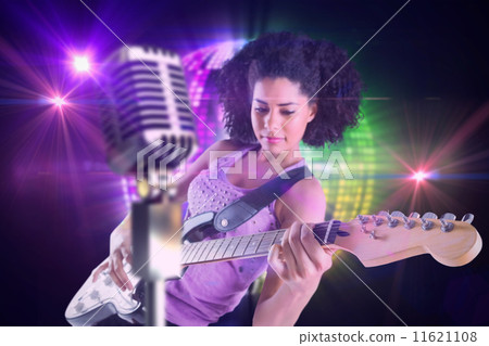 Composite image of pretty girl playing guitar Composite image of pretty girl playing guitar 11621108