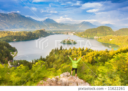 Tracking round Bled Lake in Julian Alps, Slovenia. 11622261