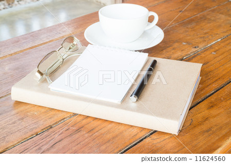 Creative time with cup of coffee and book Creative time with cup of coffee and book 11624560