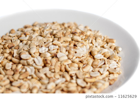roasted peanuts in a plate on white background roasted peanuts in a plate on white background 11625629