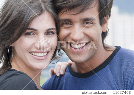 Close up of Hispanic couple smiling Close up of Hispanic couple smiling 11627408