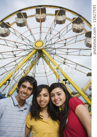 Multi-ethnic teenaged friends at carnival 11627595