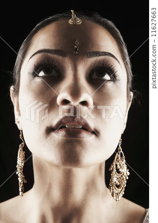 Indian woman in traditional jewelry Indian woman in traditional jewelry 11627663