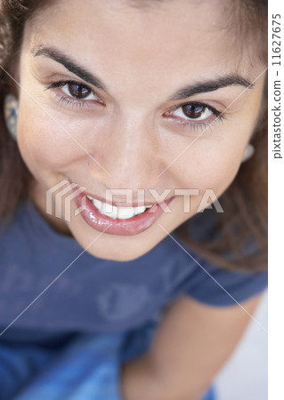 Close up of Hispanic woman smiling Close up of Hispanic woman smiling 11627675