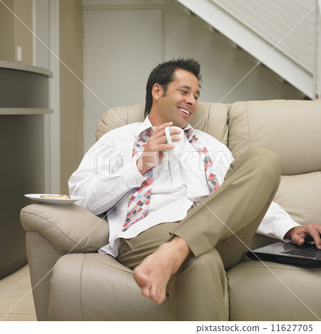 Businessman looking at laptop 11627705