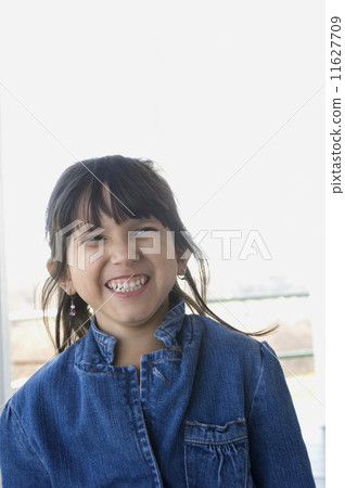 Hispanic girl laughing Hispanic girl laughing 11627709